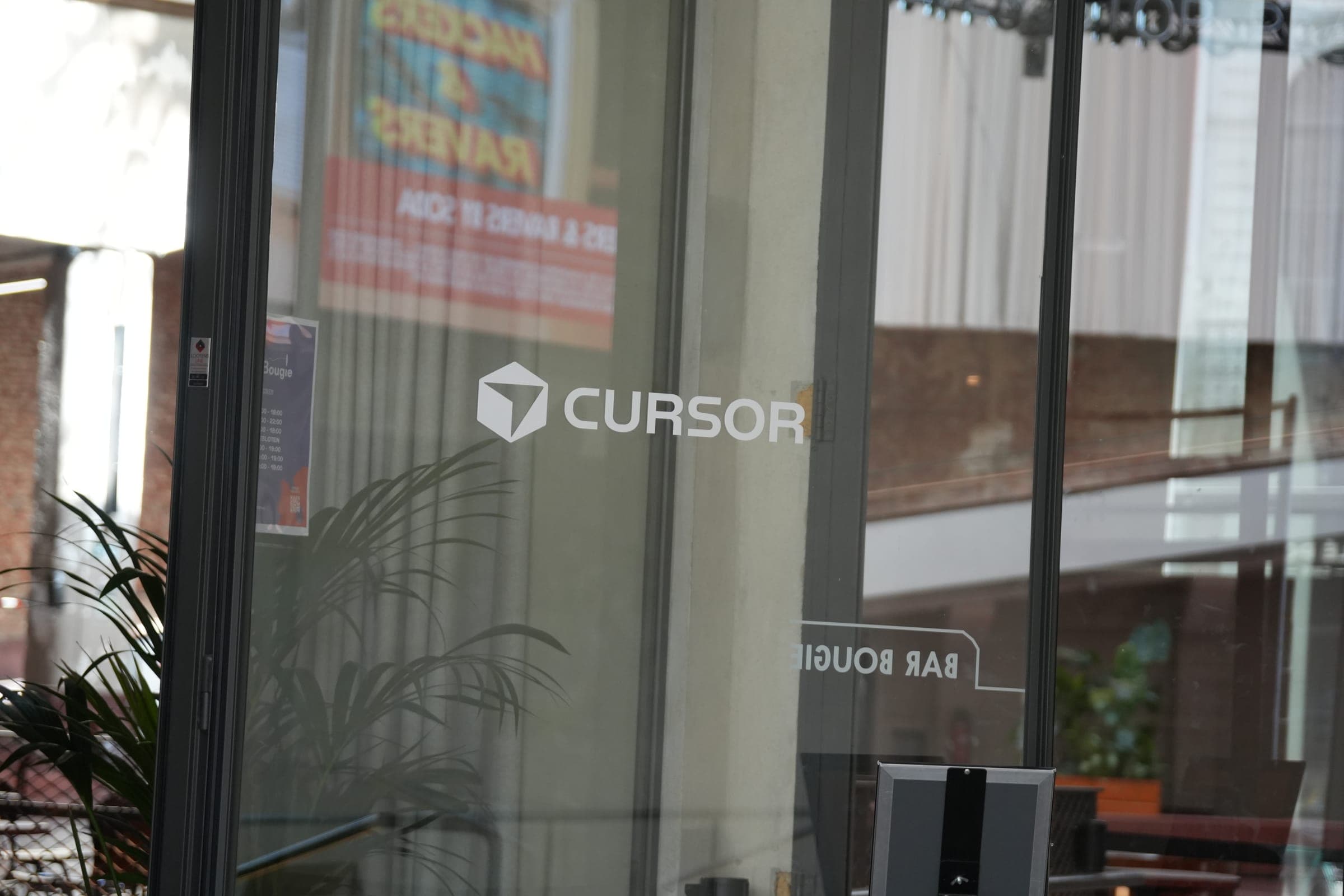 Cafe Cursor Ghent, 23 May 2026. Cursor logo on the Bar Bougie glass.