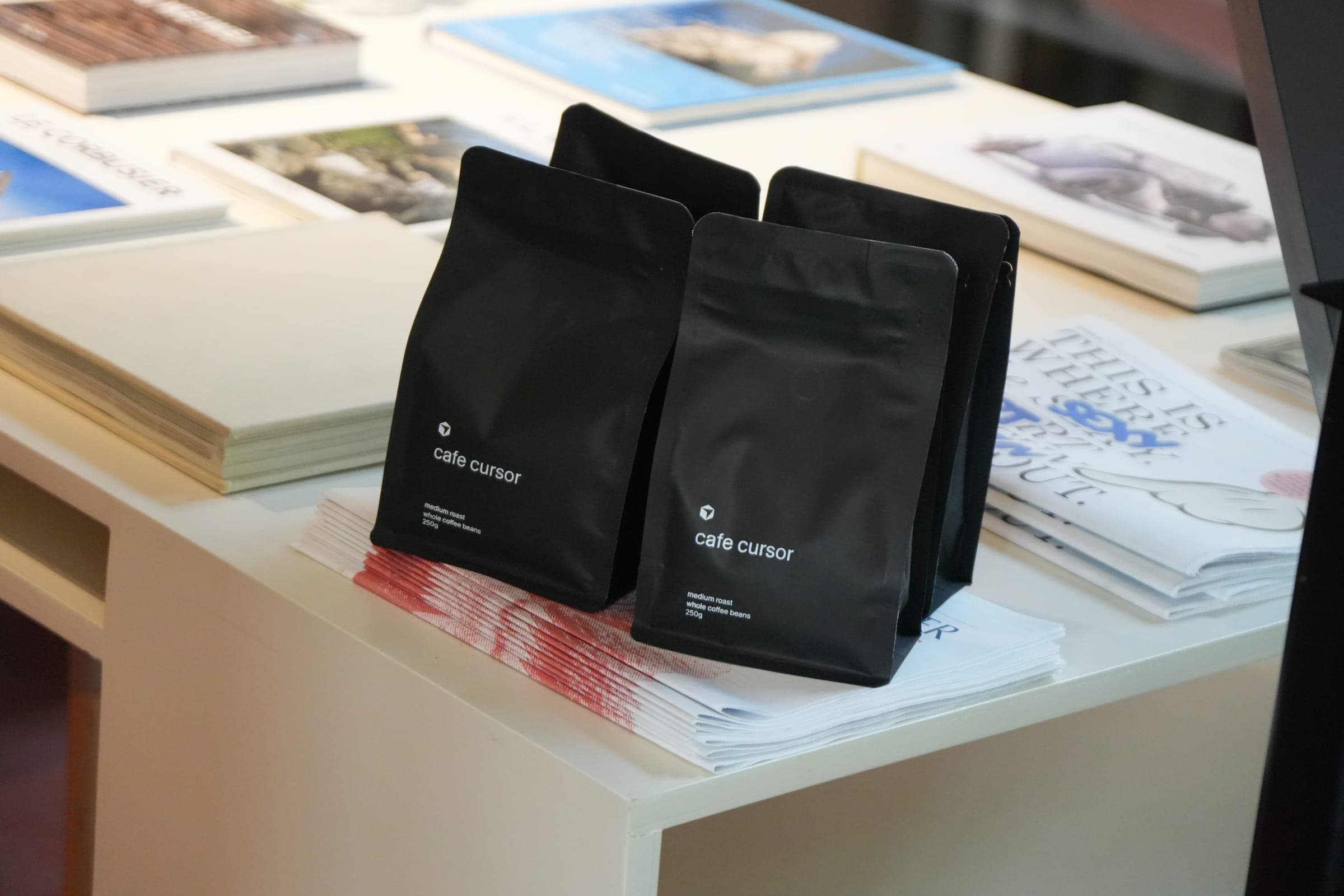 Cafe Cursor Ghent, 23 May 2026. Cafe Cursor medium roast coffee bags.