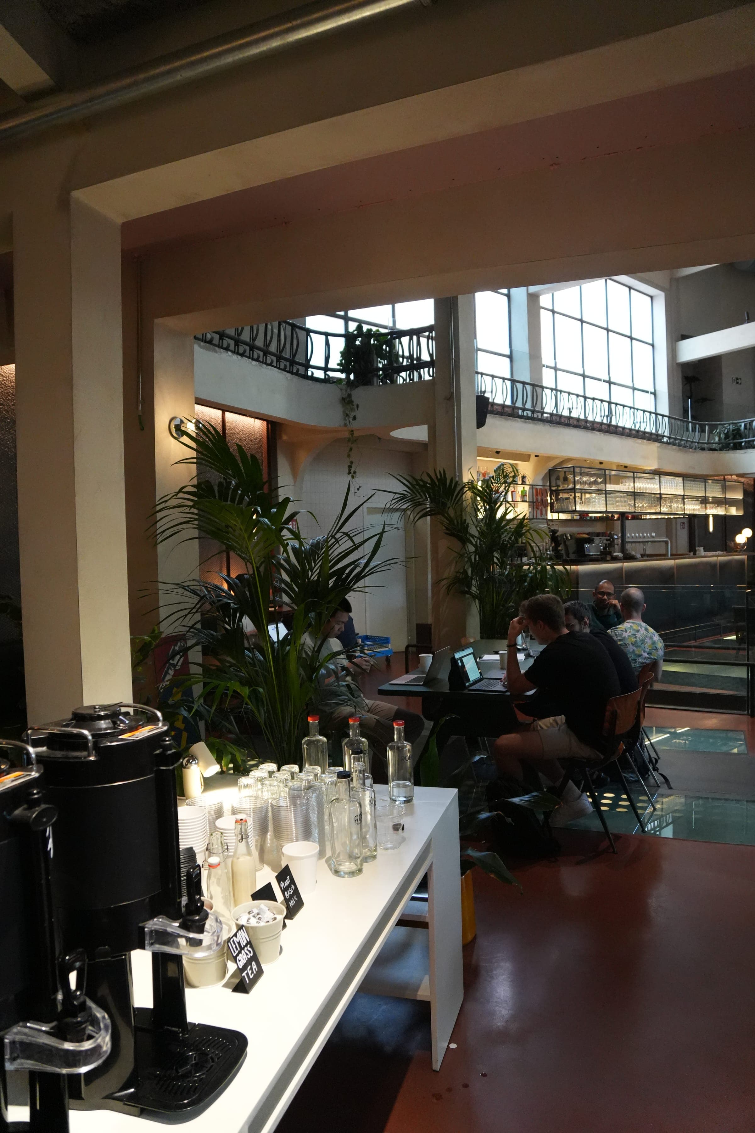Cafe Cursor Ghent, 23 May 2026. Coffee station and a table of laptops.